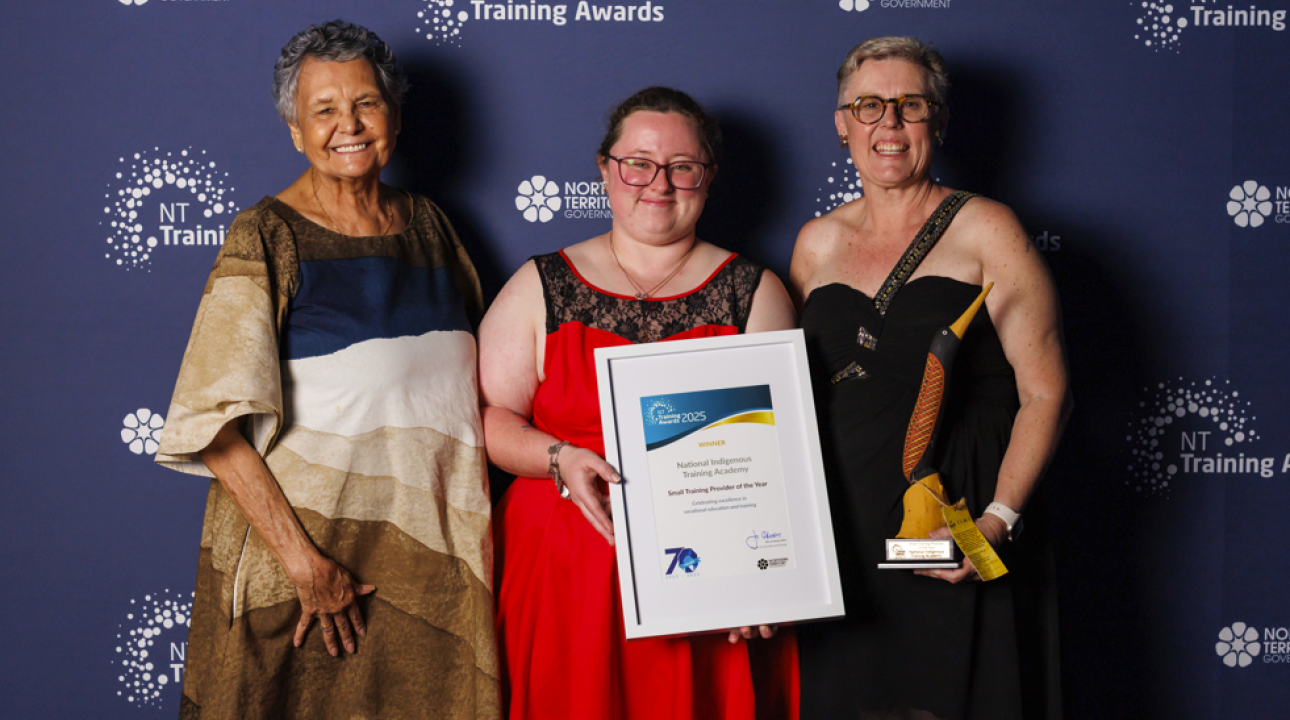 Three ladies holding the Winner certificate from 2025 NT Training Awards