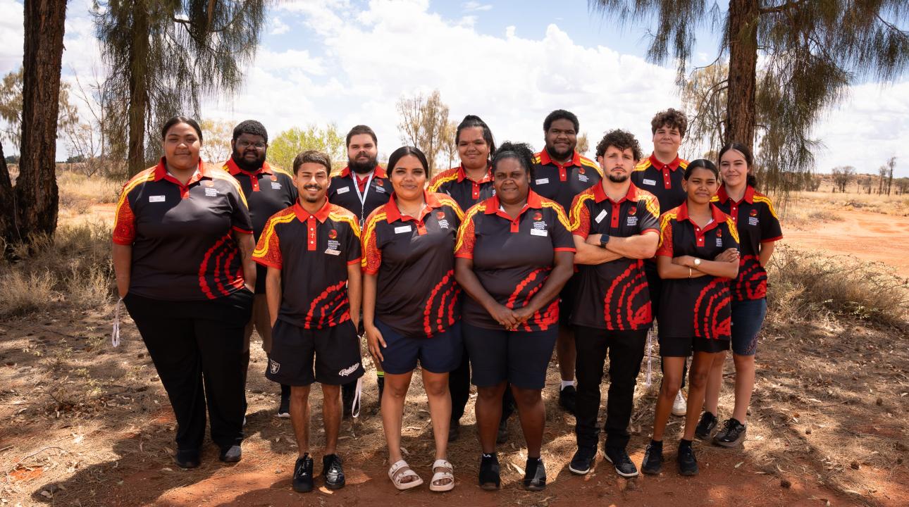 A group of Indigenous trainees graduating from the National Indigenous Training Academy in 2026
