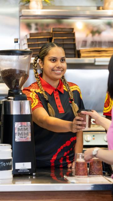 A hospitality trainee with the National Indigenous Training Academy (NITA)